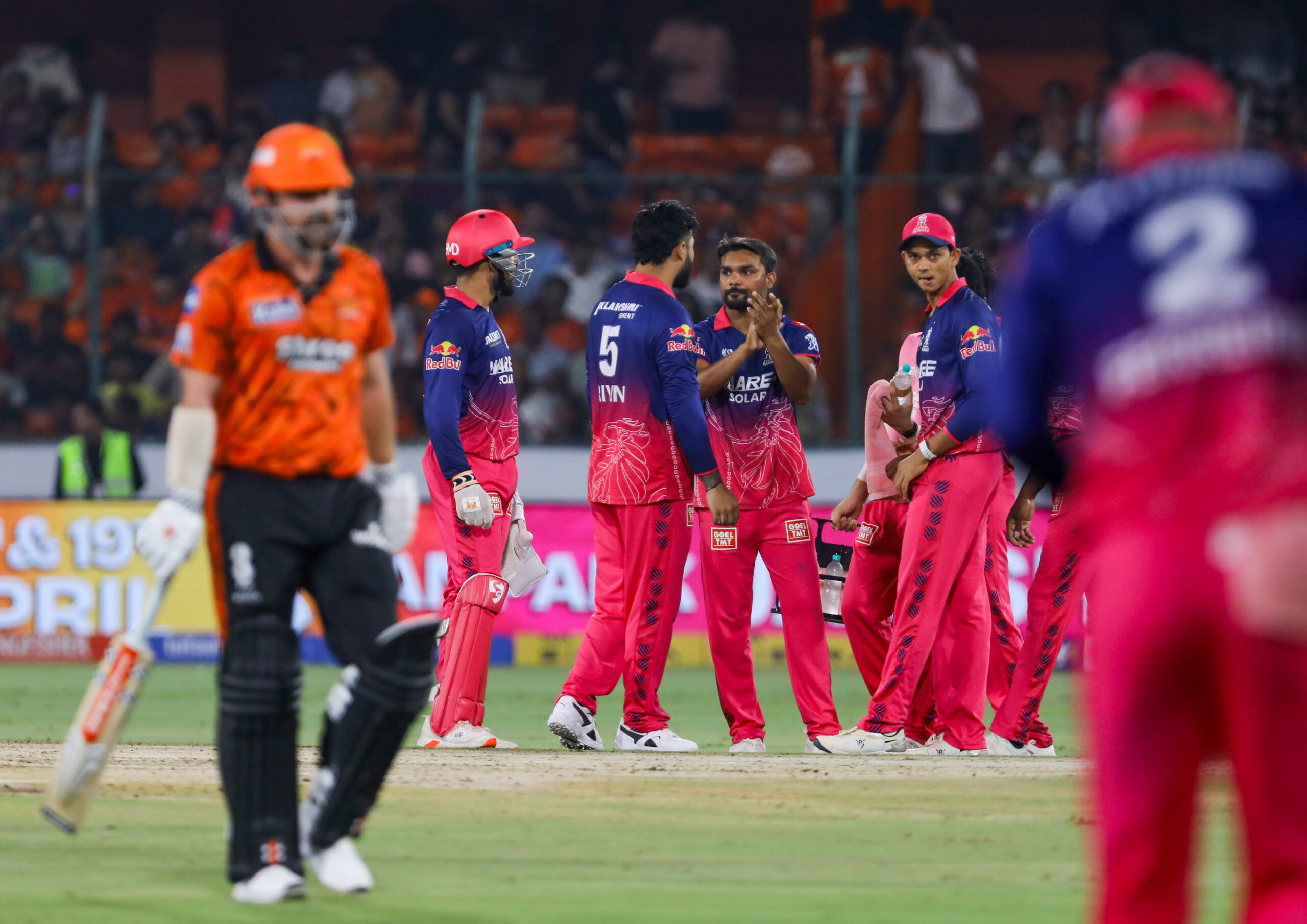 Hyderabad: Rajasthan Royals captain Riyan Parag and Sandeep Sharma celebrate the dismissal of Sunrisers Hyderabad's Travis Head during the Indian Premier League 2026 match between Sunrisers Hyderabad and Rajasthan Royals, at Rajiv Gandhi International Stadium, in Hyderabad on Monday, April 13, 2026. (Photo: IANS)